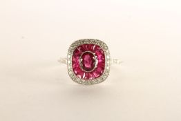 Ruby and Diamond Ring, centre set with an oval cut ruby, surrounded by a halo of calibre-cut