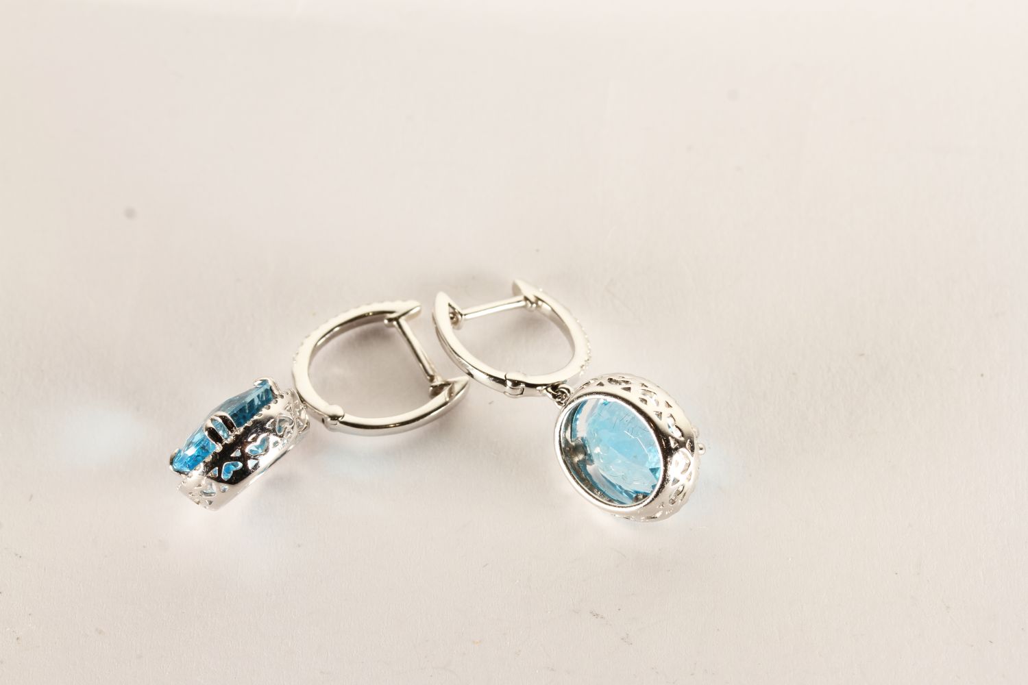 Pair of Blue Topaz and Diamond Drop Earrings, each set with an oval cut blue topaz, claw set, - Image 3 of 3