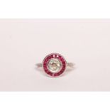 Target-Style Ruby and Diamond Ring, set with a central old cut diamond