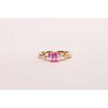 Pink Sapphire and Diamond Ring, set with an oval-cut pink sapphire