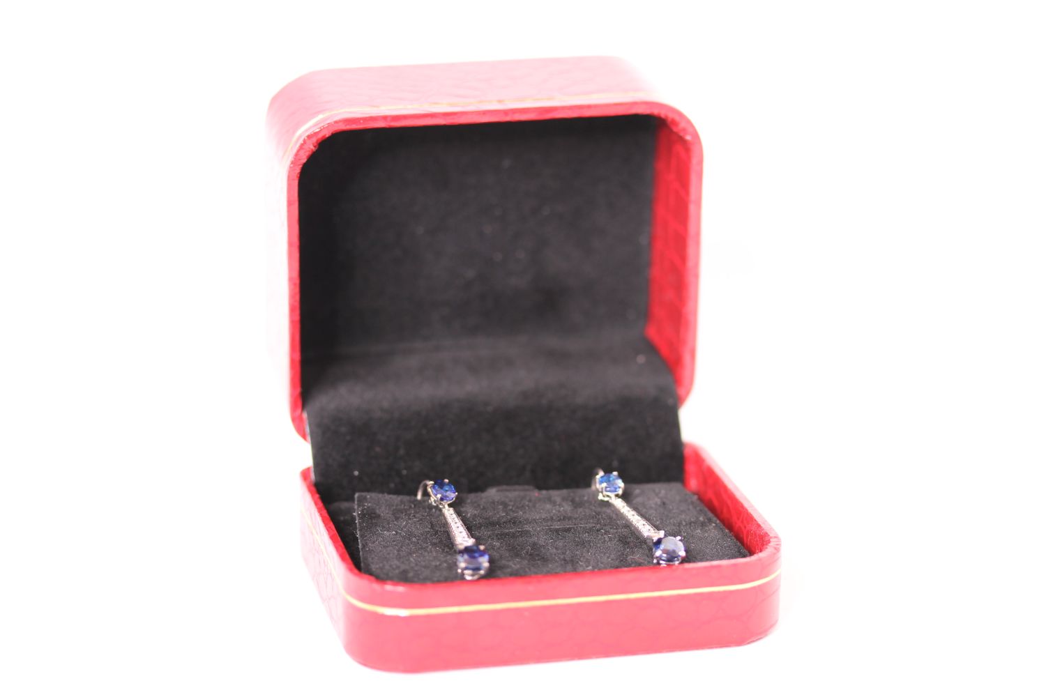 Sapphire and Diamond Drop Earrings, two oval cut blue Sapphires to each, spaced with a diamond set