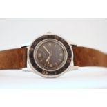 VERY RARE VINTAGE BLANCPAIN AQUA-LUNG CIRCA 1950S, circular black patina dial, baton and Arabic