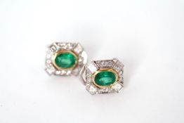 Emerald and Diamond Earrings, oval cut emeralds rubber over set in yellow gold with four trap cut