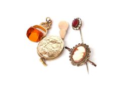 Miscellaneous items including, paste stone tie pin, cameo brooch, gold plated locket, swivel fob and