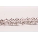 Daisy-Style Diamond Line Bracelet, approximate total diamond weight 5.20ct