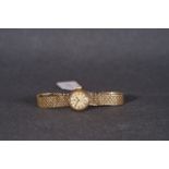 LADIES OMEGA 9CT GOLD LADYMATIC COCKTAIL WATCH, circular patina dial with hour markers and hands,