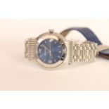 BOUCHERON WRISTWATCH, circular blue dial, stainless steel case with rotating outer bezel,
