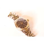 LADIES TWO TONE ROLEX DATE WRISWATCH, circular black dial with gold hands and gold hour markers,