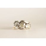 Diamond Trilogy Ring, set with 3 round cut diamonds, claw set, stamped 18ct yellow gold shank,