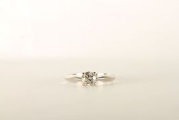 Diamond Solitaire Ring, set with a single round brilliant cut diamond, 4 claw set, stamped 18ct