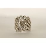 Diamond Swirl Ring, set with round brilliant cut diamonds, stamped 18ct white gold, finger size K