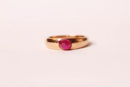 Victorian cabochon ruby dress ring, single cabochon cut ruby, approximately 5.3 x 4.7 x 4.2mm, set