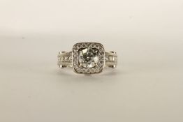 Diamond Cluster Ring, centre set with a round brilliant cut diamond, 4 claw set, shoulders and sides