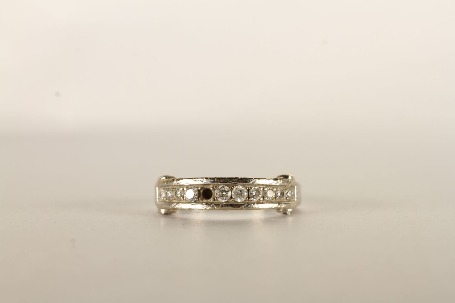 Diamond Ring, set with round brilliant cut diamonds, round brilliant cut diamonds set to either side