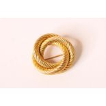 Tiffany & Co Swirl Brooch, stamped 18k yellow gold, total weight 6.2 grams.