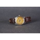 GENTLEMENS OMEGA AUTOMATIC BUMPER WRISTWATCH CIRCA 1949 - 1950, circular two tone patina dial with