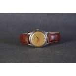 GENTLEMENS LONGINES WRISTWATCH, circular patina dial with applied gold hour markers and alpha hands,