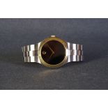 GENTLEMENS MOVADO MUSEUM WRISTWATCH, circular black mystery dial with a gold plot at 12 and gold