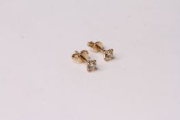 Pair of Diamond Solitaire Stud Earrings, set with round brilliant cut diamonds totalling