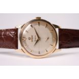 VINTAGE 1950S OMEGA GENEVE 9CT DRESS WATCH, circular two tone quartered dial, dagger hour markers,