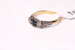 Sapphire and Diamond three stone ring, oval cut 4.5x4mm sapphire, two illusion cut diamonds, in