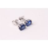 Pair of Kyanite Stud Earrings, claw set, sterling silver.