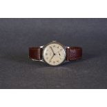 GENTLEMENS SMITHS DE LUXE WRISTWATCH, circular two tone off white dial with arabic numeral hour