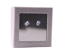 Pair of Tanzanite Stud Earrings, each set with a tanzanite, claw set, sterling silver, comes with