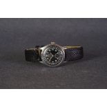 GENTLEMENS ORIS DATE WRISTWATCH CIRCA 1960s, circular black dial with patina arabic numeral hour