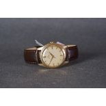 GENTLEMENS OMEGA 9CT GOLD WRISTWATCH CIRCA 1953, circular patina dial with applied gold hour markers