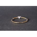 9CT YELLOW & WHITE GOLD BANGLE, a bangle produced in 9ct yellow and white gold, hinged edge,