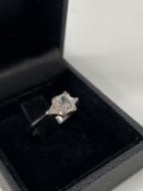 A Bespoke 3 Stone Engagement Ring, centre set with an 0.80ct E SI1 cut-cornered rectangular modified