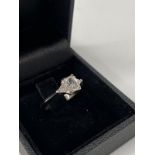 A Bespoke 3 Stone Engagement Ring, centre set with an 0.80ct E SI1 cut-cornered rectangular modified