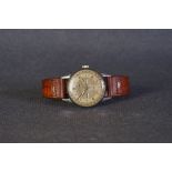 GENTLEMENS MOVADO TRIPLE CALENDAR DATE WRISTWATCH CIRCA 1950s, circular triple tone dial with