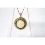 An Impressive Opal, Emerald and Diamond Necklace, central 15.7/15.8mm diameter high cabochon cut