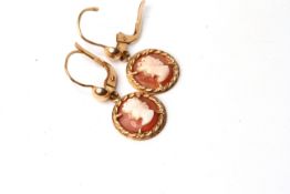 Pair of Cameo earrings, circular 7mm round cameos, yellow gold frames, tested as 9ct or higher, hoop
