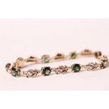 9CT GREEN STONE AND DIAMOND FANCY BRACELET, total weight 9.6gms, length 17cms.