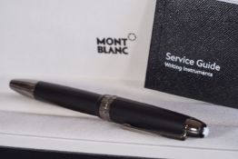 MONT BLANC BALL POINT PEN W/ BOX & BOOKLET, matte black colour with dark grey silver accents, ball