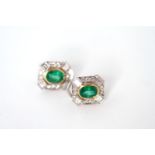 Emerald and Diamond Earrings, oval cut emeralds rubber over set in yellow gold with four trap cut
