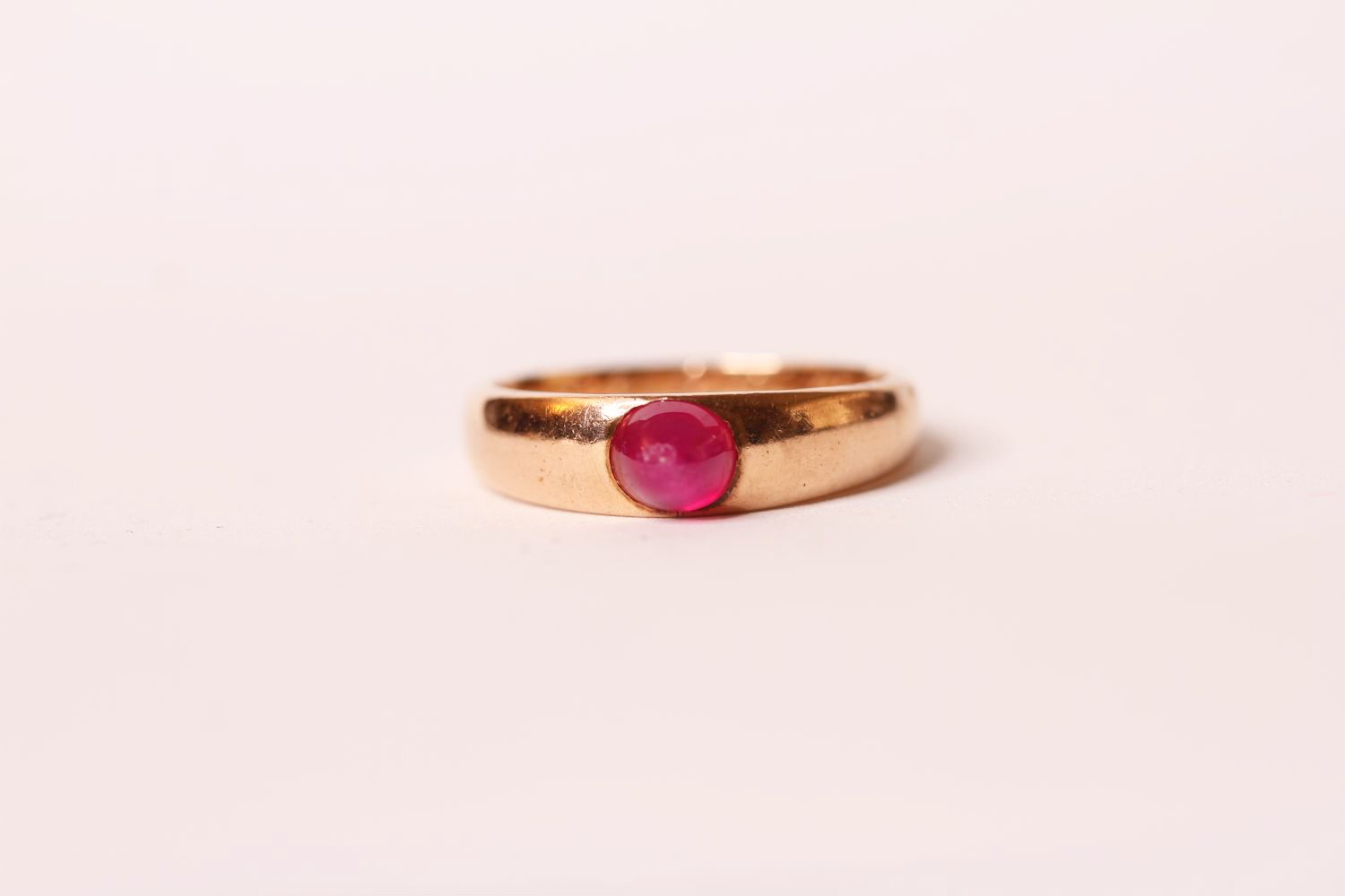 Victorian cabochon ruby dress ring, single cabochon cut ruby, approximately 5.3 x 4.7 x 4.2mm, set