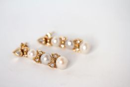 Pearl and diamond drop earrings, three graduating pearls with diamond set bow spacers, flat cut