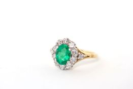 Emerald and Diamond cluster ring, oval cut fine Emerald approximately 8x6mm, brilliant cut diamond