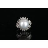 Large pearl and diamond fancy cocktail ring, mounted in white metal stamped 18K, large white pearl