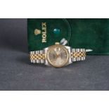 LADIES ROLEX OYSTER PERPETUAL DATEJUST DIAMOND SET WRISTWATCH REF. 68273, circular monogram