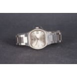 GENTLEMENS LONGINES AUTOMATIC WRISTWATCH, rounded oval silver dial with hour markers and hands, 35mm