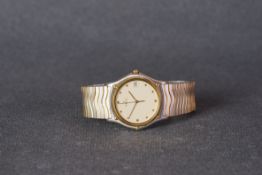 GENTLEMENS EBEL CLASSIC WAVE WRISTWATCH, circular cream dial with gold dot hour markers and hands,