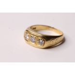 18CT GOLD THREE STONE DIAMOND RING W/ BOX, an 18ct gold ring set with three diamonds, estimated