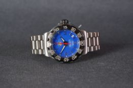 GENTLEMENS TAG HEUER FORMULA 1 DATE WRISTWATCH, circular blue dial with silver hour markers and