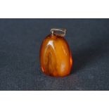 BALTIC AMBER & 14CT GOLD BALE PENDANT, a large baltic amber pendant with 14ct gold, 52x34mm