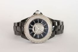 LADIES CHANEL J12 CERAMIC QUARTZ, circular dial set with diamonds, black outer dial with white